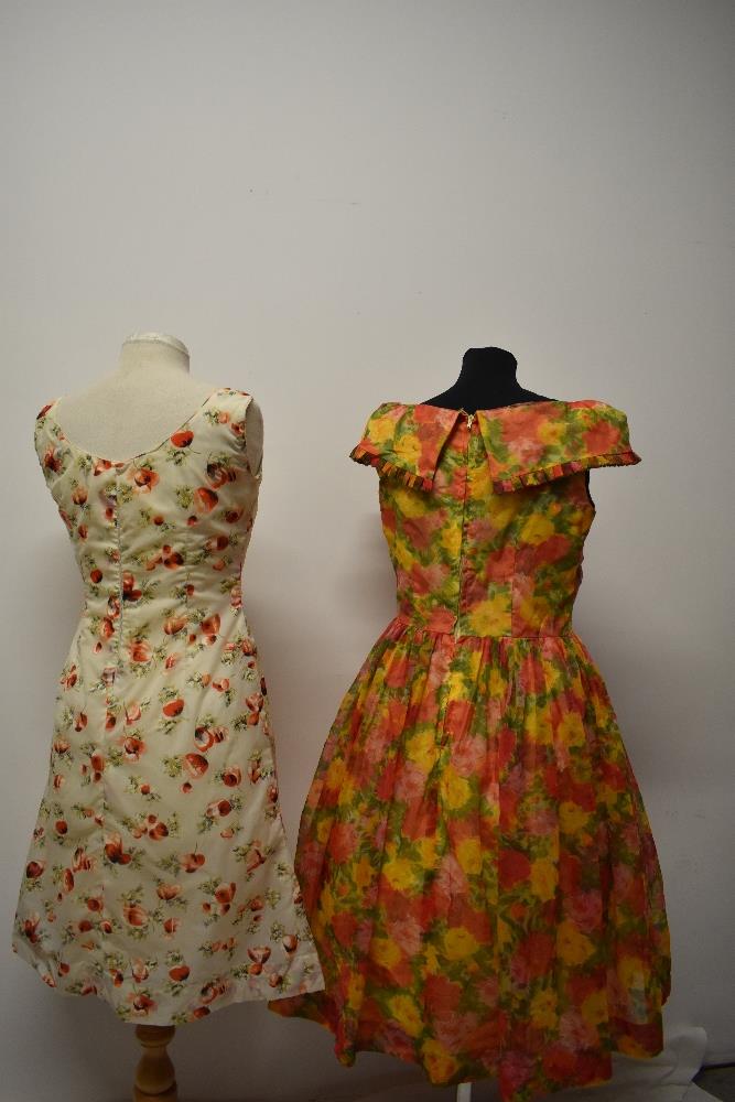 Two 1950s dresses, including vibrant floral dress with full skirt and shawl collar. - Image 6 of 8