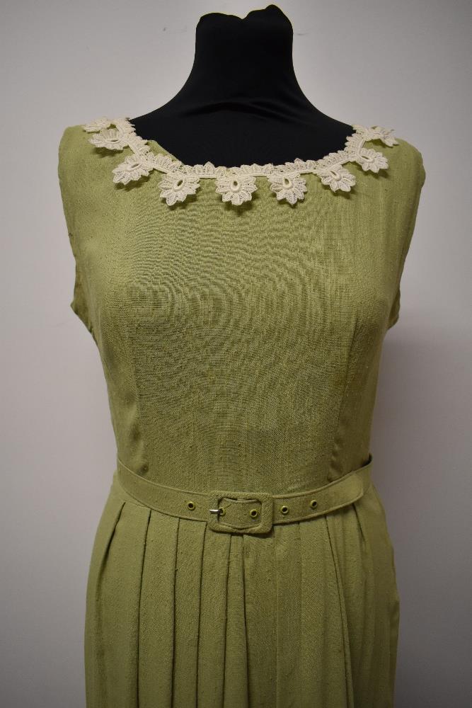 An early 1950s pistachio green slub linen or linen blend day dress, having pleated skirt, boat - Image 2 of 8