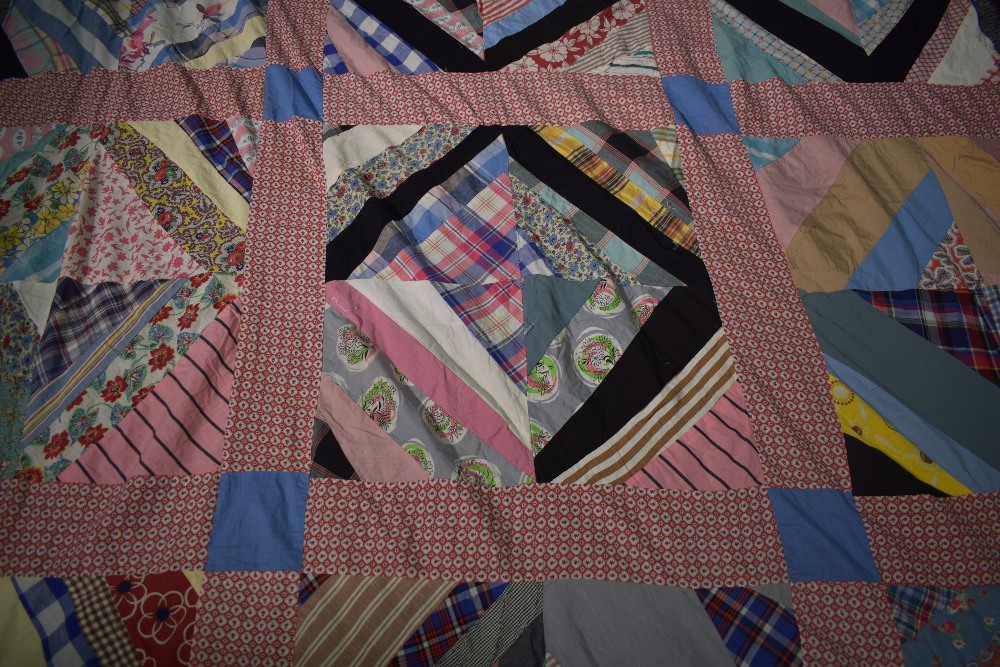 A vintage unfinished / unbacked patchwork coverlet, using bright floral and patterned fabric ( - Image 6 of 8