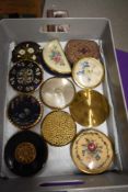 Ten vintage compacts, including those decorated with swans and flowers etc.