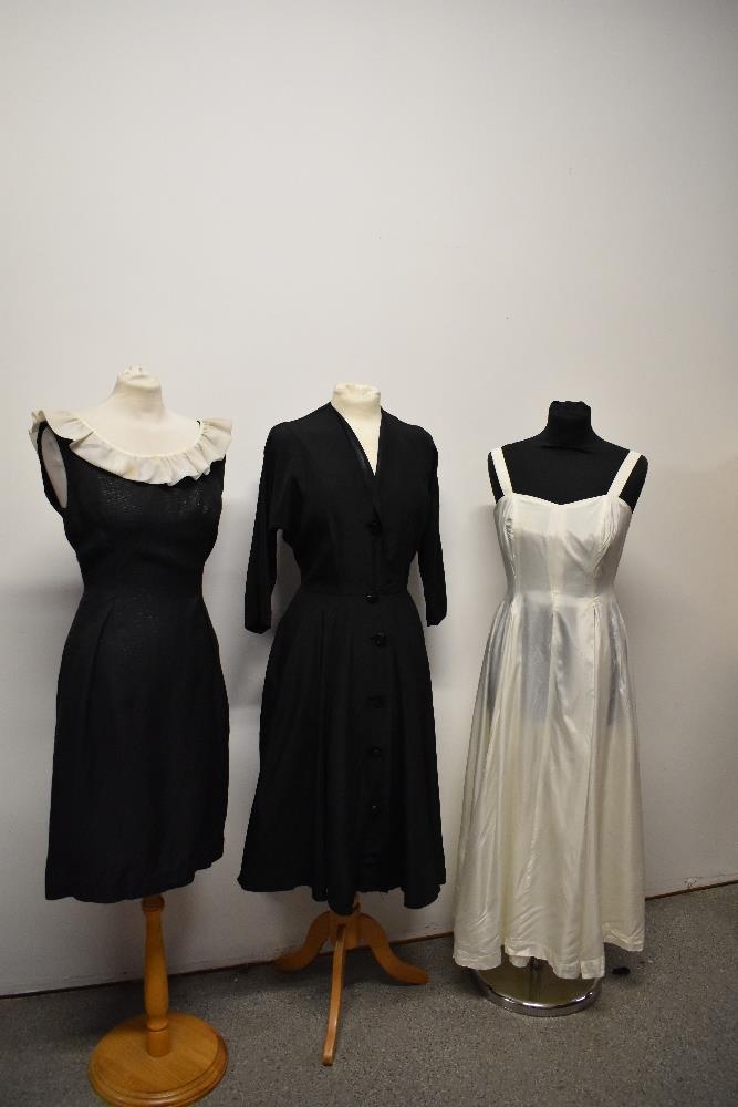 A 1950s charcoal grey with metallic thread day dress, having ruffled white collar, a 1940s/50s black