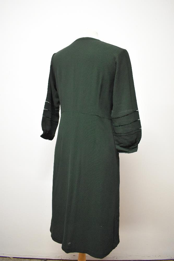 A 1930s bottle green day dress, having ladder work to sleeves and bodice, with cream twist detail to - Image 6 of 6