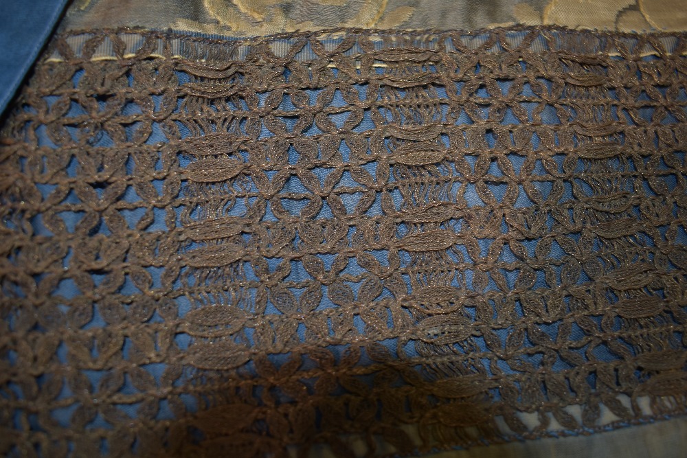 An unusual antique bed throw, having unusual braided metal border to one side and blue and gold - Image 3 of 6