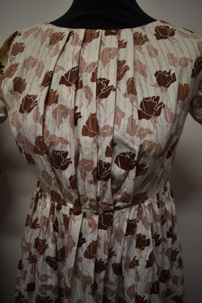 A 1960s autumnal print Trevira dress and a 1950s abstract roe patterned cotton day dress. - Image 3 of 5