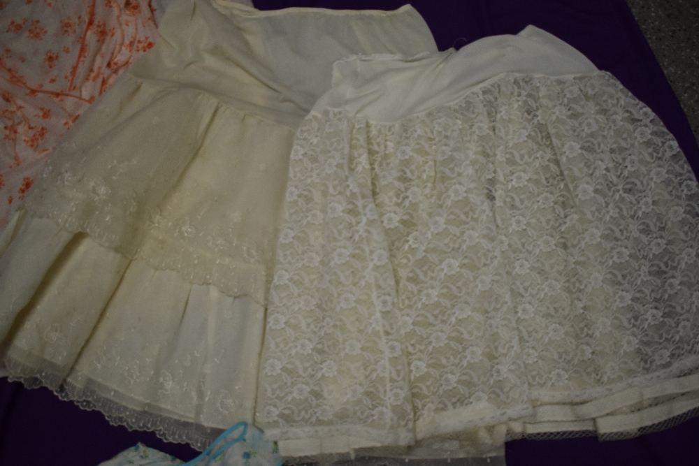 A large collection of vintage underwear and nightwear, including nylon slips, petticoats, knickers - Image 3 of 7