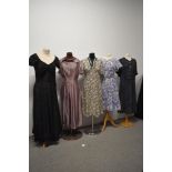 Five 1930s to 50s dresses and gowns, all with damage and / or repair, some wearable with