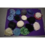 Sixteen vintage hats, 1940s to 1960s, including mink trimmed velvet example and black felt