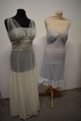 A 1950s semi sheer Kayser Bondor nylon nightdress in white with blue lace inserts to bodice, sold