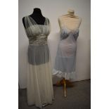 A 1950s semi sheer Kayser Bondor nylon nightdress in white with blue lace inserts to bodice, sold