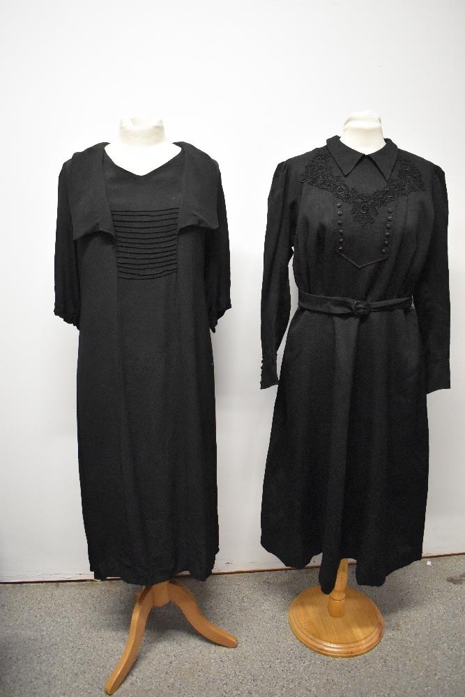 Two 1930s black dresses, including one of crepe with draped collar.