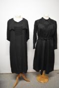 Two 1930s black dresses, including one of crepe with draped collar.
