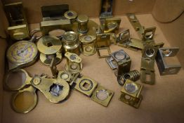 A selection of vintage brass linen testers/magnifiers.