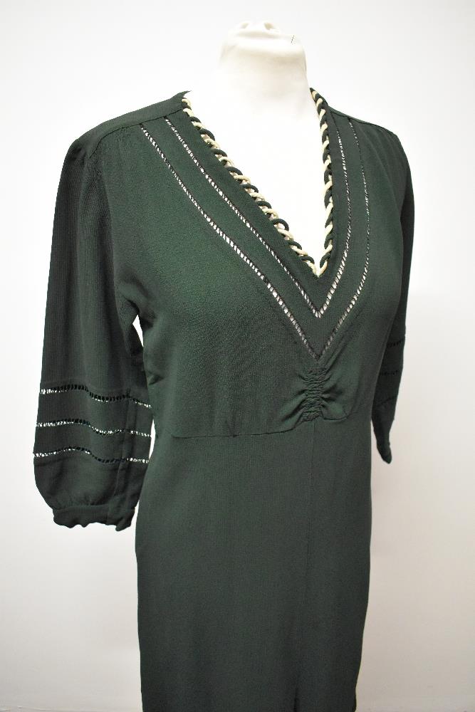 A 1930s bottle green day dress, having ladder work to sleeves and bodice, with cream twist detail to - Image 3 of 6