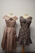 A dusty pink 1950s evening dress having shawl collar,side metal zip and pleated skirt and a 1960s