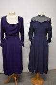 A 1930s navy blue silk dress, having sheer bodice with lace to scalloped section and hem, buttons to