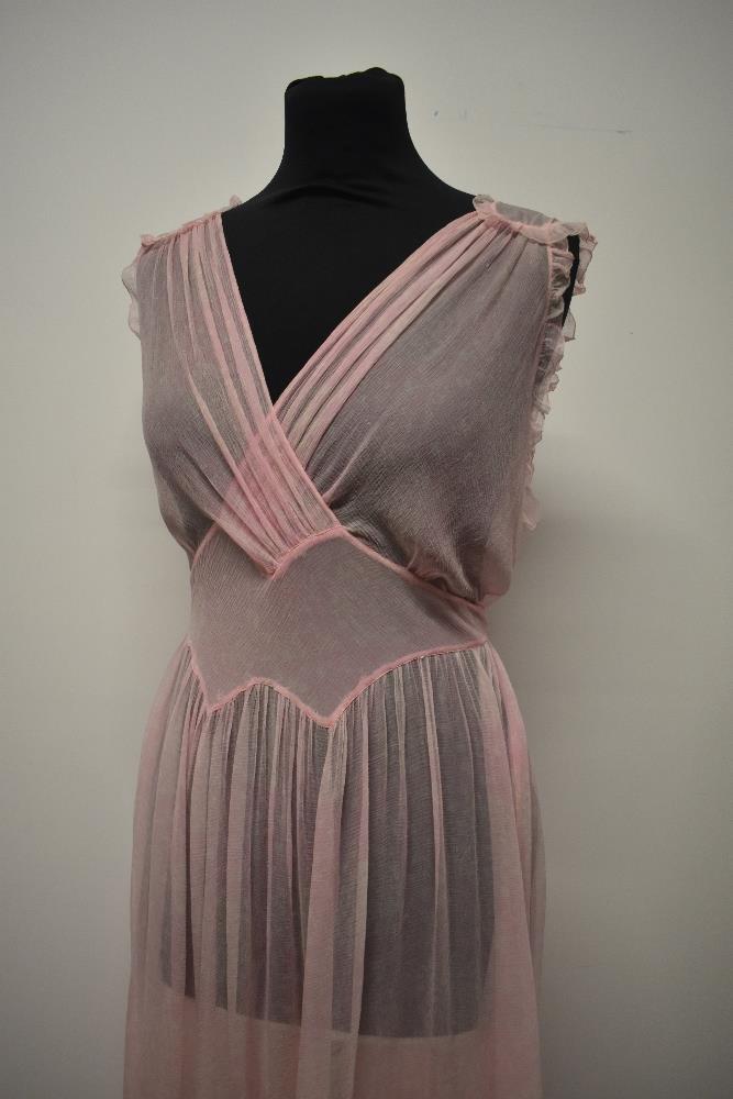 A floaty 1930s silk chiffon nightdress, in pale pink having delicate white floral pattern, cross - Image 3 of 13