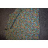 A vintage cotton wool filled double bed cover, having vibrant fruit print and hand stitched