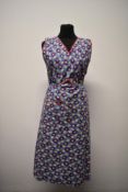 A 1940s floral overall / pinafore.