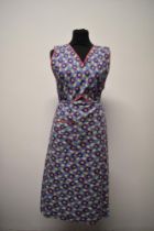A 1940s floral overall / pinafore.