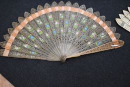 A circa 1815 horn brise fan, having pierced and hand painted flowers and another of larger