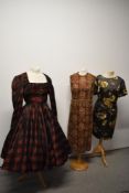 Two 1960s vintage dresses and one 1950s dress, one a maxi dress with sequins and metallic thread