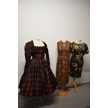 Two 1960s vintage dresses and one 1950s dress, one a maxi dress with sequins and metallic thread