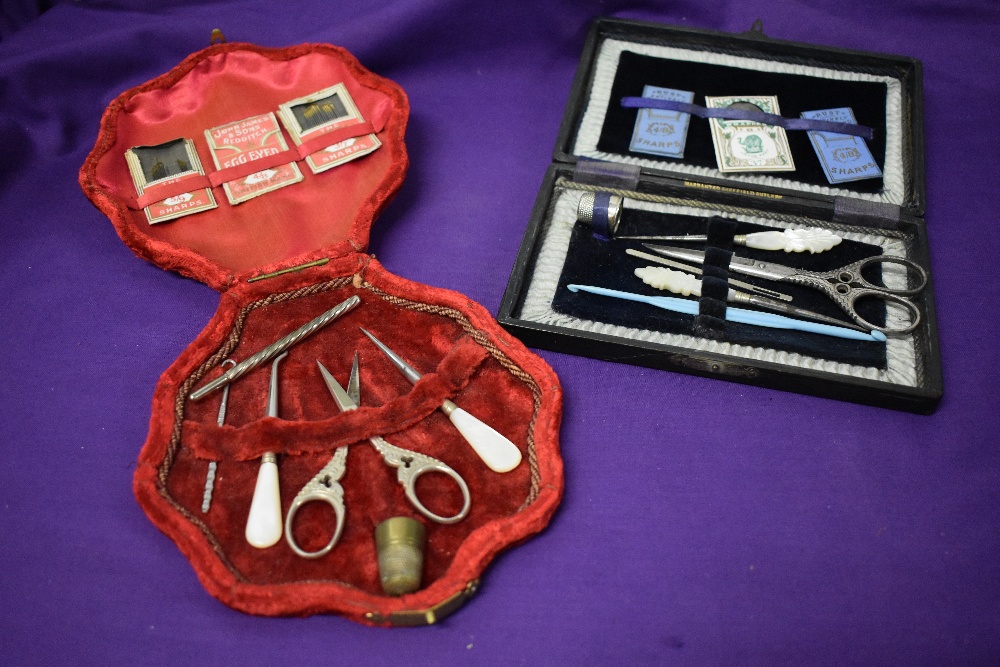 Two Edwardian sewing kits.