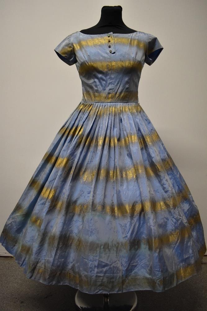 A 1950s blue and gold dress, having full pleated skirt, diamante accents to bodice and rear metal - Image 2 of 8