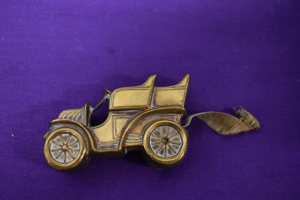 An Edwardian brass measuring tape in the form of a car. - Image 3 of 5