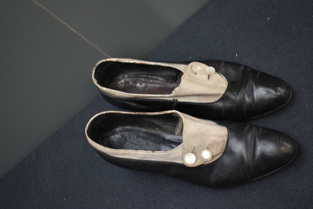 A pair of early 20th century black leather and cream suede shoes, having button decoration and stack - Image 3 of 8