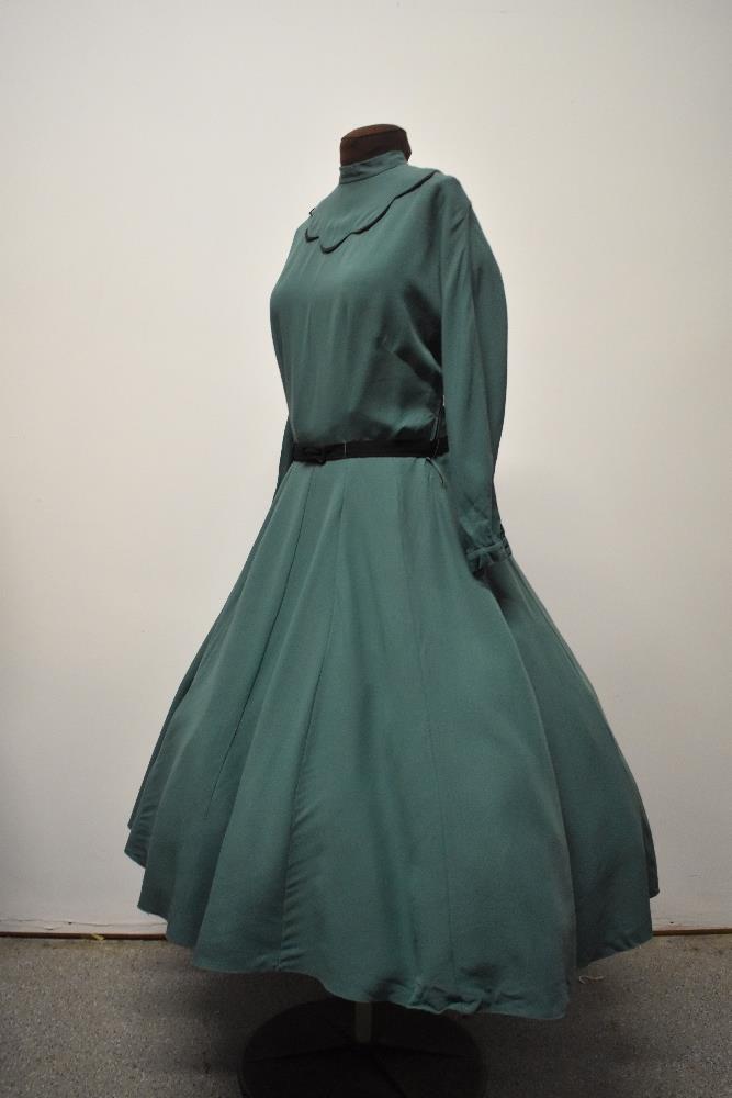 A 1950s green day dress, having black scalloped detail to bodice, high collar, long sleeves, full - Image 6 of 7