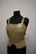 A stunning 1930s evening top, having extensive and heavy beading and sequin work.