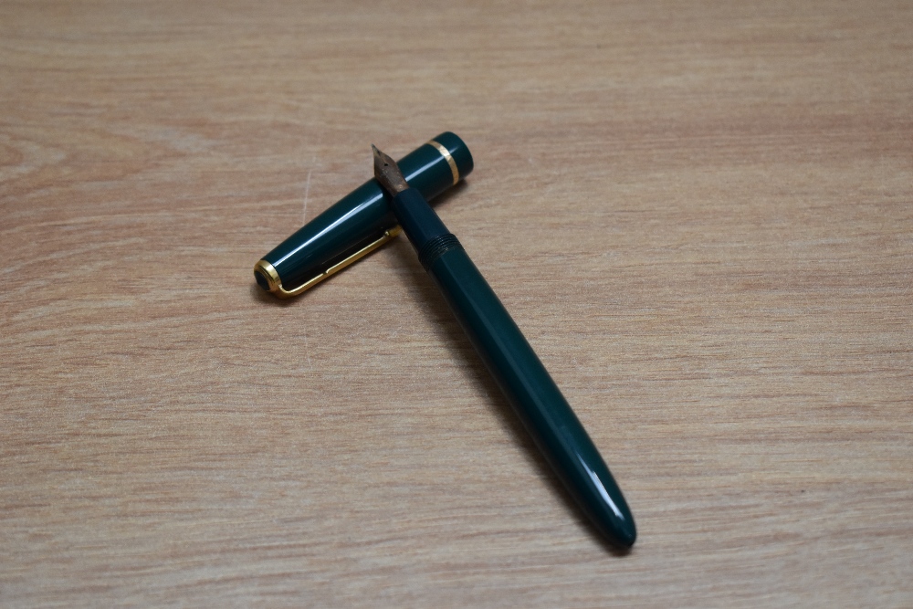 A Parker Slimfold aero fill fountain pen in green with narrow decorative band to the cap having