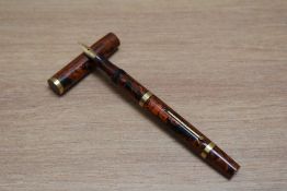 A Mabie Todd Swan Self Filler SF130 lever fill fountain pen with band to top of clipless cap and two