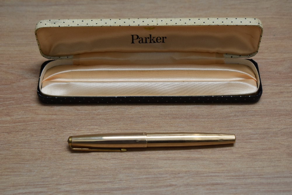 A Parker 65 aero fill fountain pen in rolled gold having Parker 14k nib. Engraved and dent to - Image 3 of 3