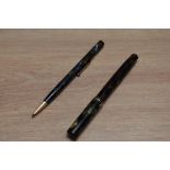 A Mabie Todd & Co Swan SM2/58 lever fill fountain pen and propelling pencil set in green, gold and