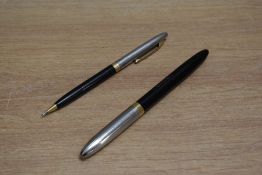 A Sheaffer Clipper TM snorkel fill fountain pen and propelling pencil in black with white spot