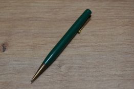 A Mabie Todd & Co Fyne Poynt propelling pencil in green. Some marks to top of the pencil