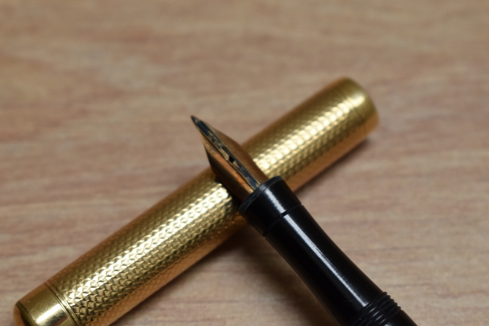 A Mabie Todd & Co Swan 2 eye dropper fountain pen in engine turned yellow metal having Mabie - Image 2 of 3