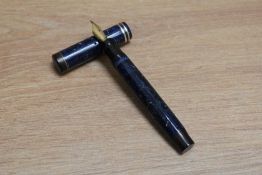 A Parker Duofold Junior button fill fountain pen in lapis lazuli blue with white flecks with two