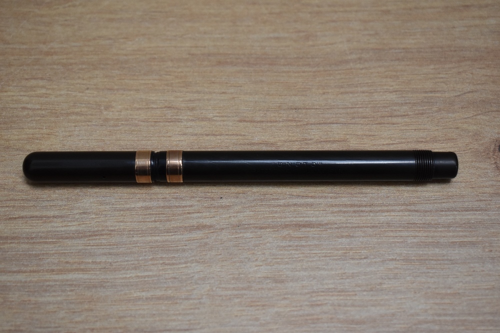A De La Rue Onoto plunger fill fountain pen in BHR with gold band to the base of the cap and one - Image 3 of 3
