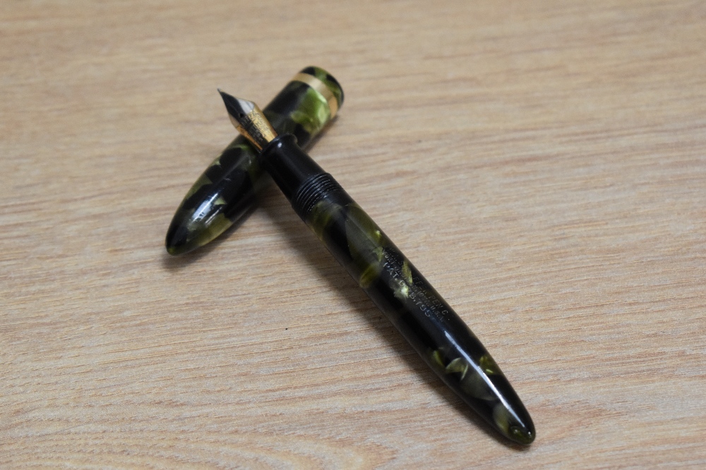 A Sheaffer Lifetime Balance lever fill fountain pen in marine green with white spot and single