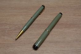 A Mabie Todd & Co Swan Ladies lever fill fountain pen and propelling pencil set in sage green with