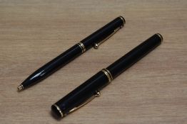 A Sheaffer Connoisseur aerometric fill fountain pen and ballpoint set in black, the fountain pen