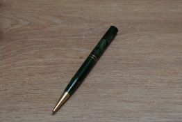 A Mabie Todd & Co Fyne Point propelling pencil in green swirl with two narrow bands