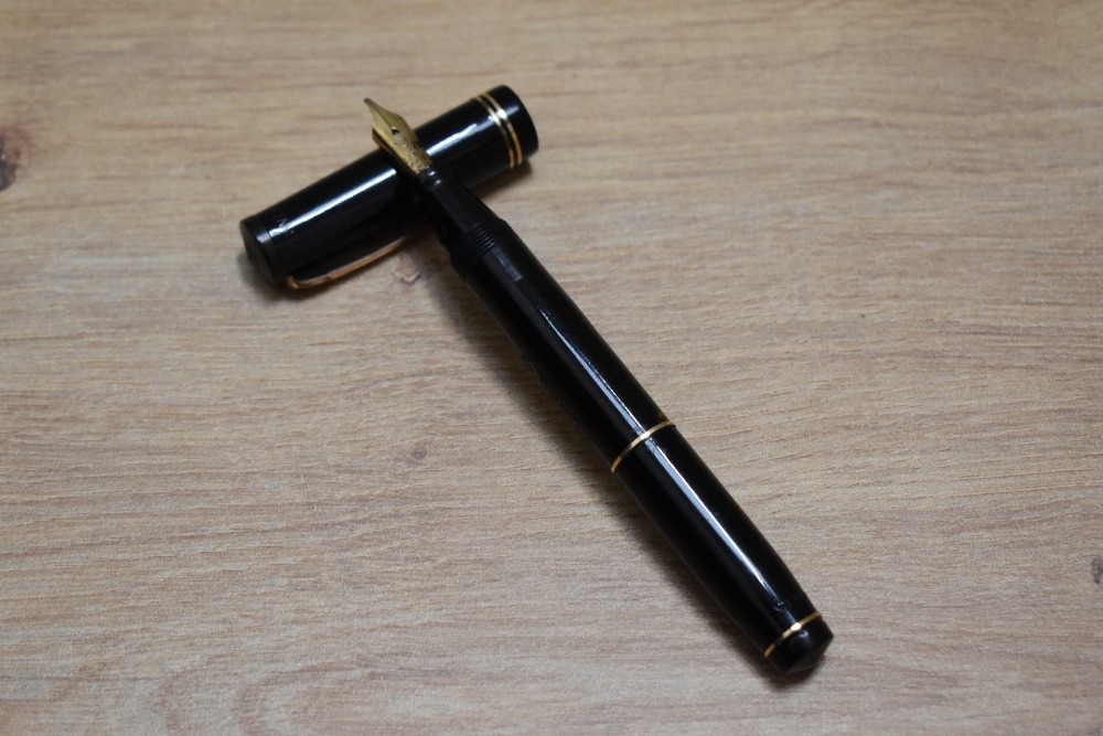 A Mabie Todd & Co Swan Visofil VT340/60 fountain pen in black with two narrow bands to the cap