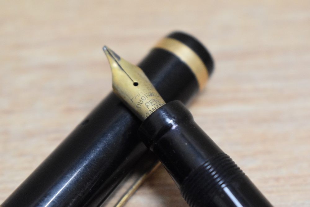 A Parker Duofold Junior button fill fountain pen in black with single band to the cap having - Image 2 of 3