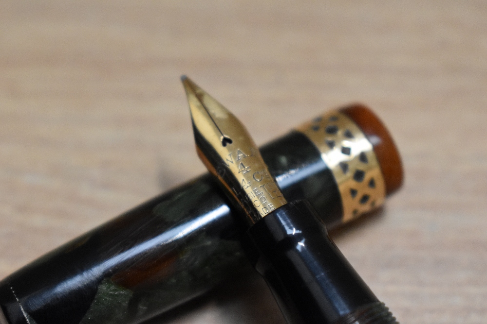 A Mabie Todd & Co Swan Visofil fountain pen in russet and jade with broad pierced band to the cap - Image 2 of 3