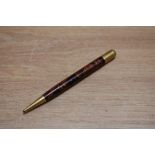 A small Mabie Todd Fyne Poynt propelling pencil in black and red hard rubber