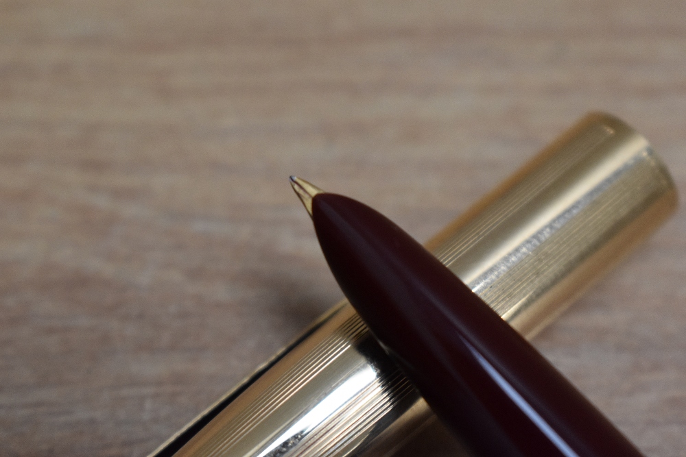 A De La Rue Onoto K1 Plunger fill fountain pen in burgundy with window in barrel and gold cap having - Image 2 of 3